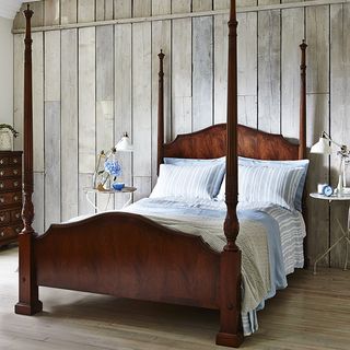 bedroom with wooden four poster bed