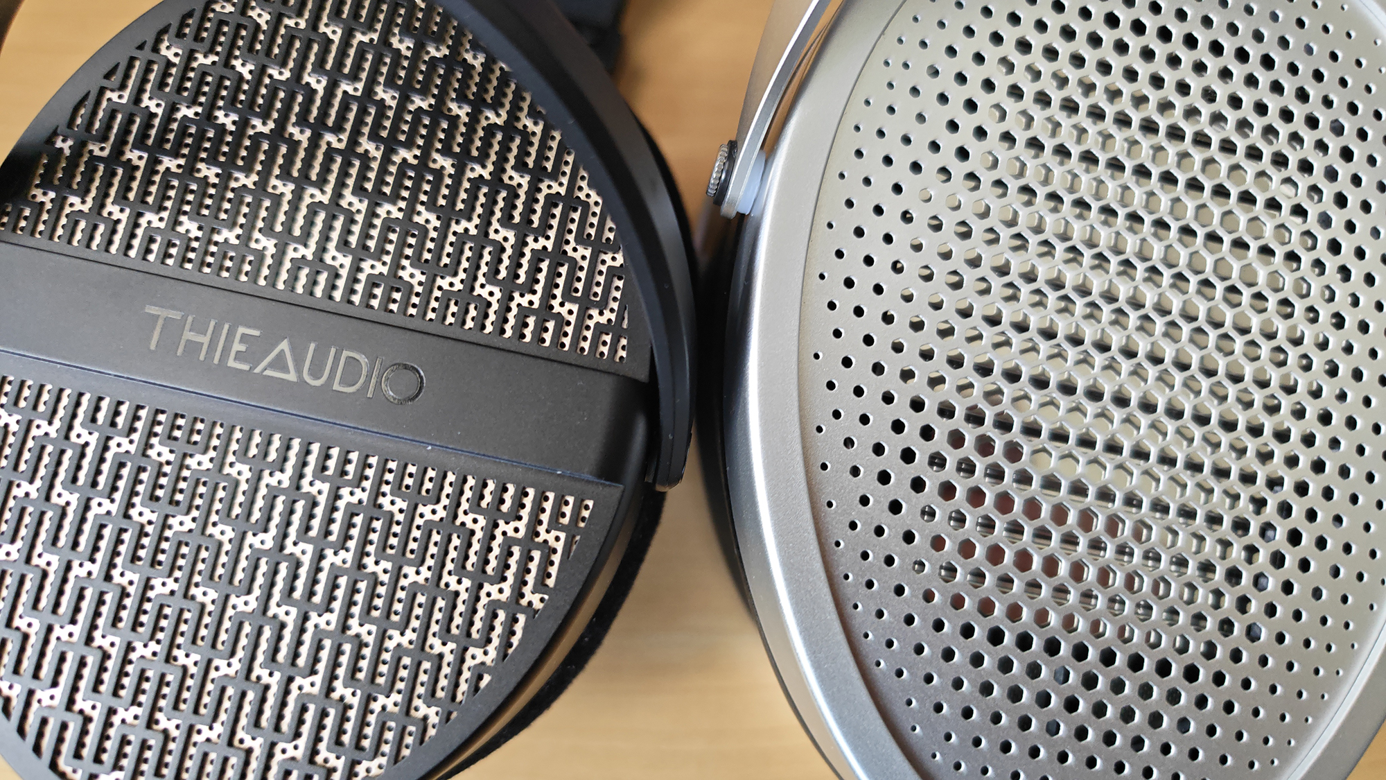 The HiFiMan Edition XV and the Thieaudio Cypher headphones side-by-side.