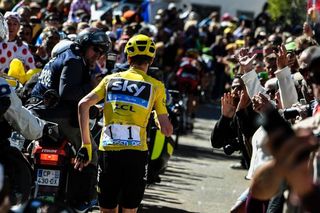 Chris Froome runs for the line during stage 12 of the Tour de France
