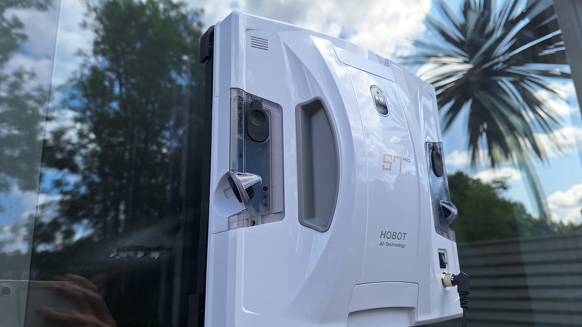 Close up of ultrasonic spray nozzle spraying window