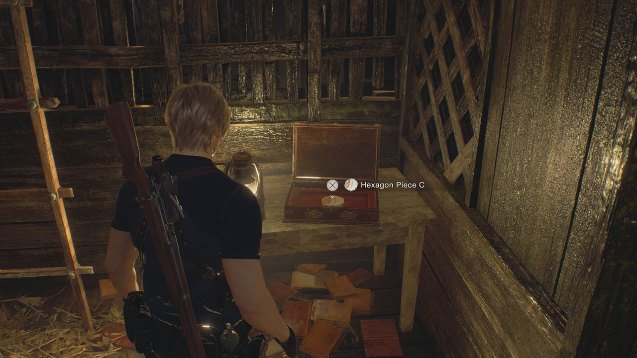 Resident Evil 4 Remake hexagon piece C in a case on a table