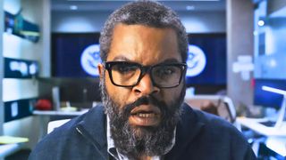 Ice Cube looking shocked at a computer screen