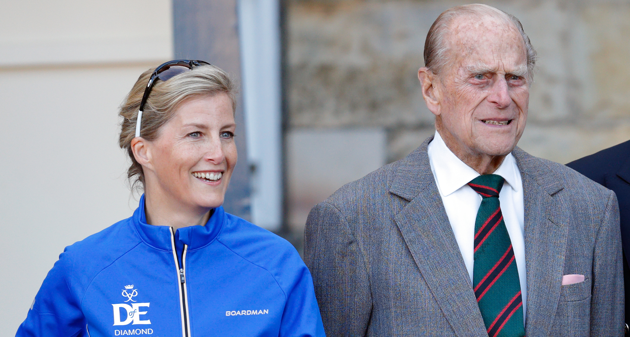 Duchess Sophie wearing a blue jacket standing next to Prince Philip 