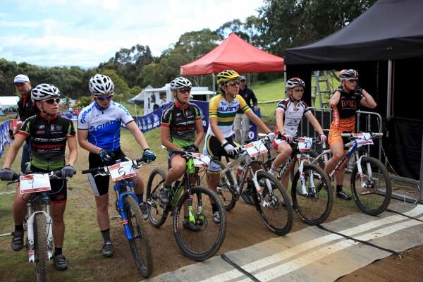 The elite women on the starting line for the short track at Glenorchy MTB Park.