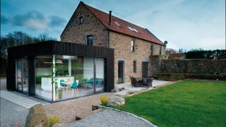 contemporary extension to barn