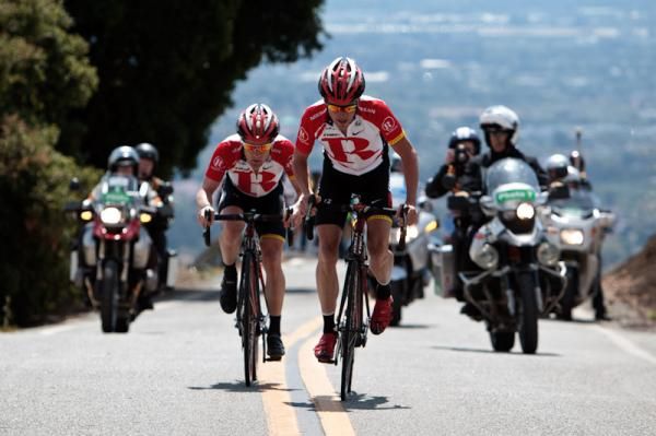 Chris Horner takes the lead from his RadioShack team leader Levi Leipheimer in the final kilometres