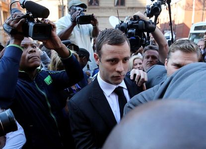 Judge finds Oscar Pistorius not guilty of murdering girlfriend Reeva Steenkamp
