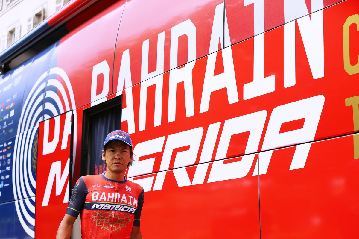 Yukiya Arashiro steps out of the Bahrain-Merida team bus
