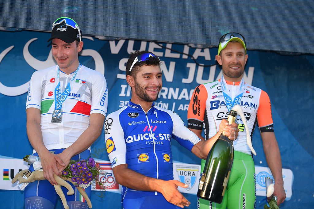 Fernando Gaviria enjoying the spoils of victory