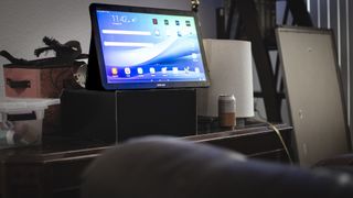 Samsung Galaxy View in a living room among moving mess