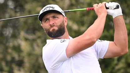 Jon Rahm takes a shot during a practice round before the 2023 US Open