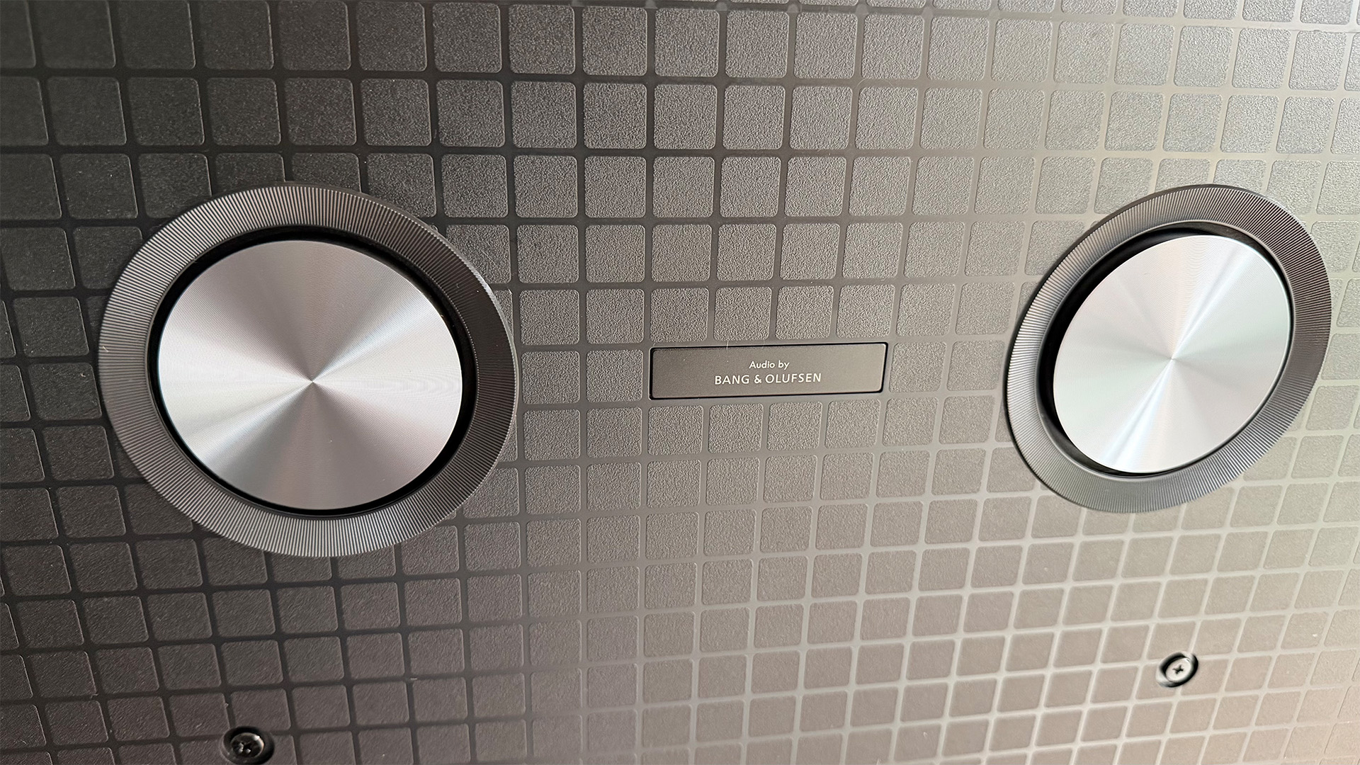 TCL C7L Mini LED TV rear of set showing speakers