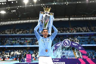 Newcastle United MANCHESTER, ENGLAND - MAY 23: Ferran Torres of Manchester City celebrates with the Premier League Trophy as Manchester City are presented with the Trophy as they win the league following the Premier League match between Manchester City and Everton at Etihad Stadium on May 23, 2021 in Manchester, England. A limited number of fans will be allowed into Premier League stadiums as Coronavirus restrictions begin to ease in the UK. (Photo by Michael Regan/Getty Images)