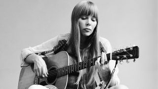 Joni Mitchell with guitar