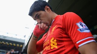 Luis Suarez celebrates after scoring for Liverpool against Norwich in 2014.
