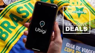 A phone showing the Ubigi logo next to a TechRadar badge that reads 'Exclusive deals'