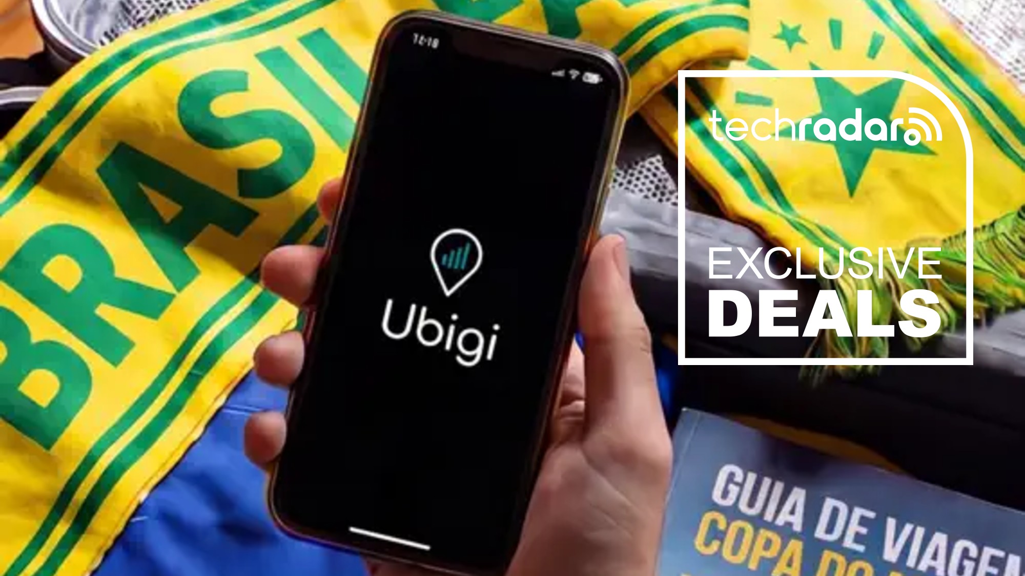 A phone showing the Ubigi logo next to a TechRadar badge that reads 'Exclusive deals'