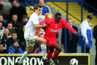 Emile Heskey of Liverpool and Jonathan Woodgate of Leeds United battle for the ball during an FA Cup match in 2001