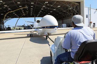 Global Hawk Pushed Back to Aircraft Hangar