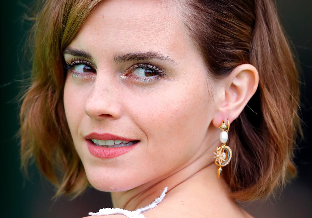 Emma Watson posing on the red carpet.