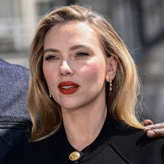 Scarlett Johansson wears a black miniskirt