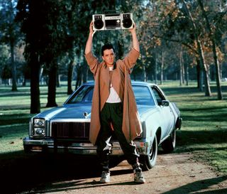 john cusack holds up a radio in an iconic scene in Say Anything