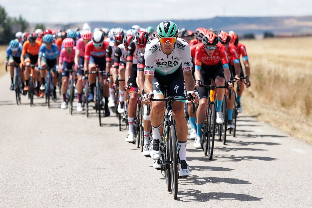BRIVIESCA SPAIN AUGUST 04 Daniel Oss of Italy and Team Bora Hansgrohe leads The Peloton during the 43rd Vuelta a Burgos 2021 Stage 2 a 175km stage from Tardajos to Briviesca VueltaBurgos BurgosCycling CapitalMundialdelCiclismo on August 04 2021 in Briviesca Spain Photo by Gonzalo Arroyo MorenoGetty Images