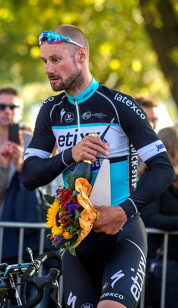 Tom Boonen (Etixx-QuickStep) holding podium flowers