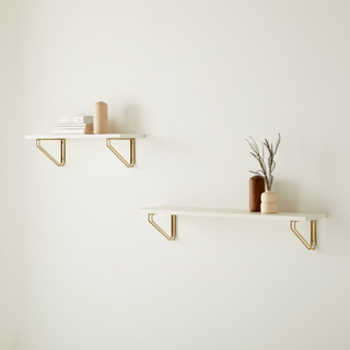 Pair of floating shelves with brass hardware