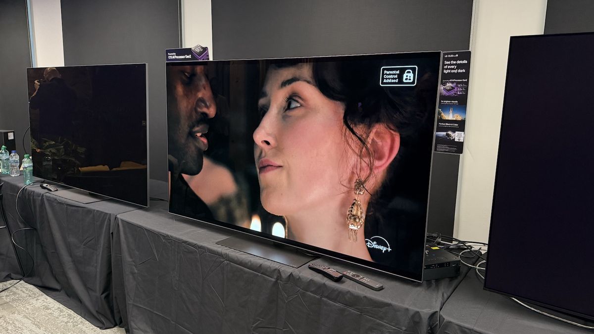 The 65-inch LG G5 OLED TV standing on a grey table. On the screen is an image from boxing TV show &#039;A Thousand Blows&#039;