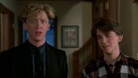 Anthony Michael Hall on the left looking stunned, Ilan Mitchell-Smith on the right looking confused in Weird Science