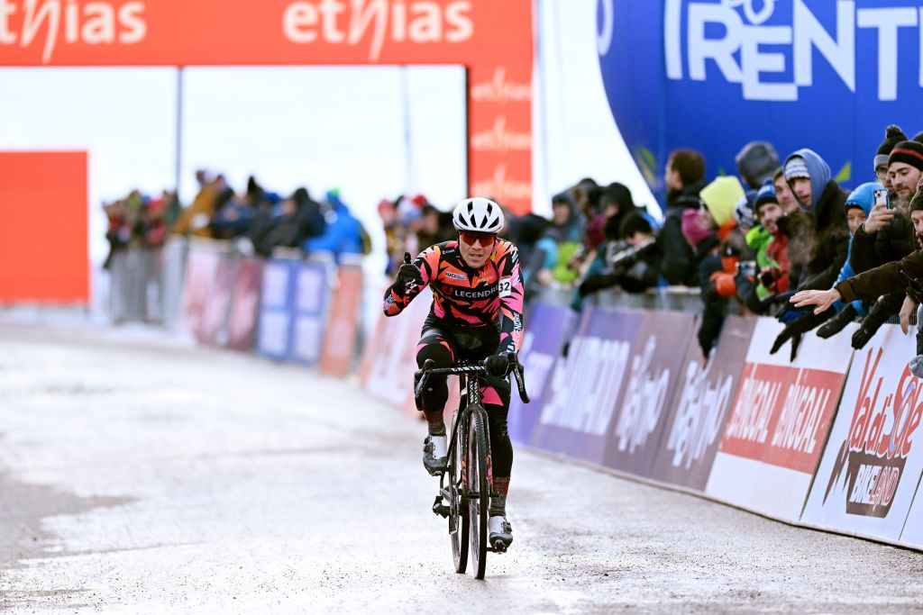 VERMIGLIO ITALY DECEMBER 17 Timon Ruegg of Switzerland and Cross Team Legendre crosses the finish line during the 2nd UCI Cyclocross World Cup Val Di Sole 2022 Mens Elite CXWorldCup on December 17 2022 in Vermiglio Italy Photo by Dario BelingheriGetty Images