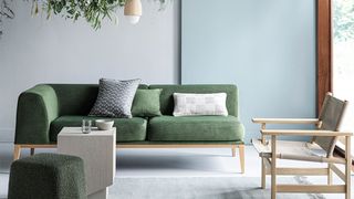 Best living room paint colors with green sofa and pale green walls