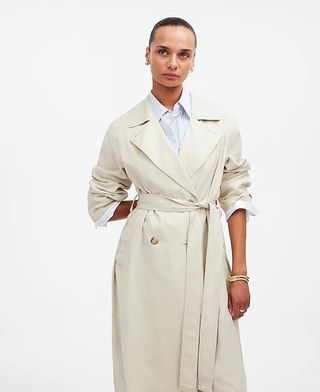 madewell model wearing tied cream trench coat