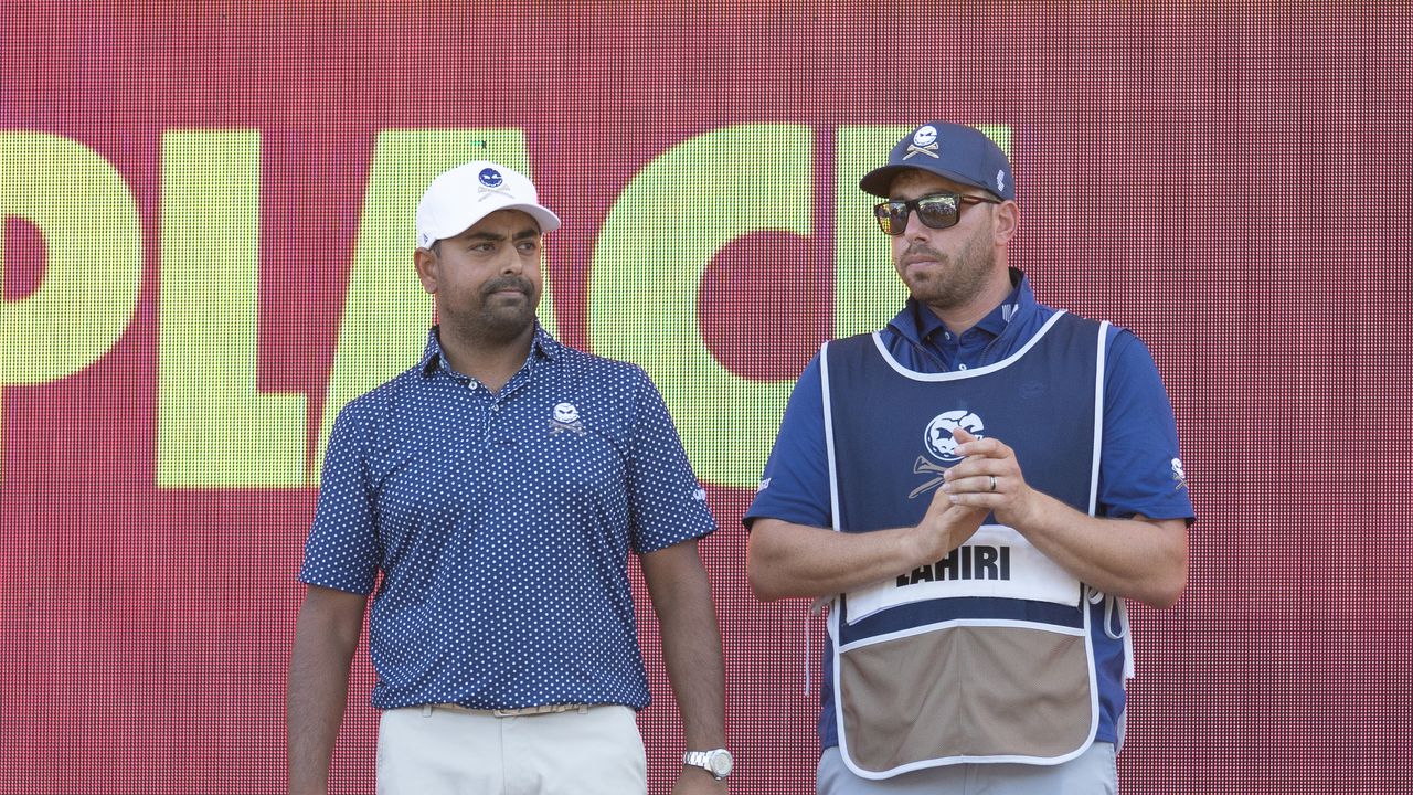 Anirban Lahiri and caddie Tim Giuliano at LIV Golf Chicago in 2023