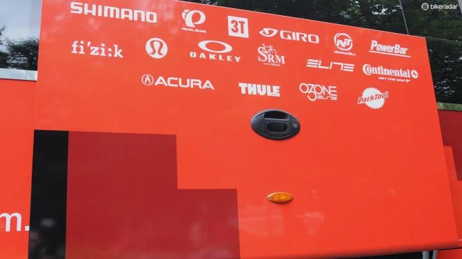 The BMC Racing team's array of sponsors are displayed on the door