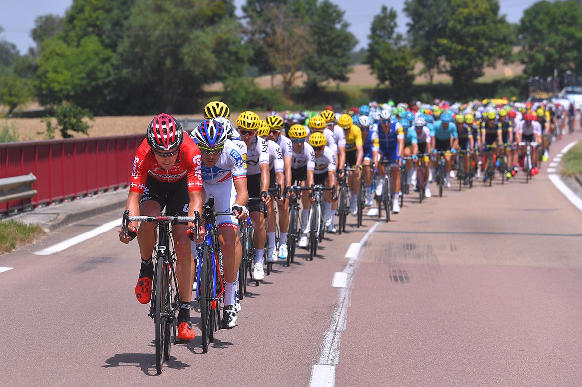 The Tour de France peloton lined out on stage 7