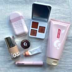 Flatlay of some of the best Glossier products included in this guide