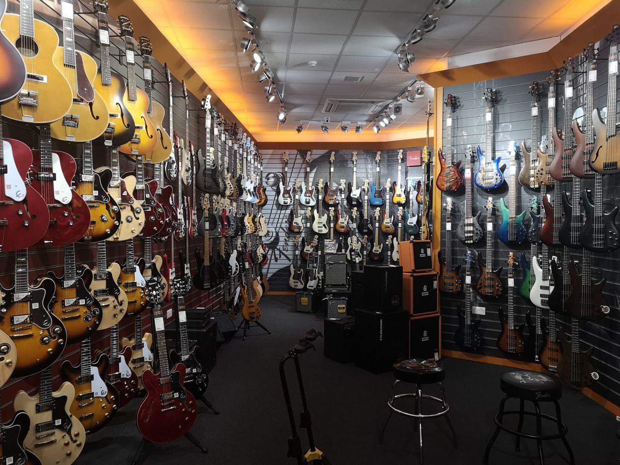 Here's a 1x image in a guitar shop. There's quite a lot of detail even at 10MP but dynamic range could be improved by using the night mode.