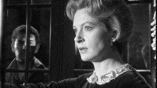 The ghost of Quint and the Governess in The Innocents