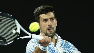 Novak Djokovic of Serbia plays a forehand prior to his first match at the Paris Masters 2023