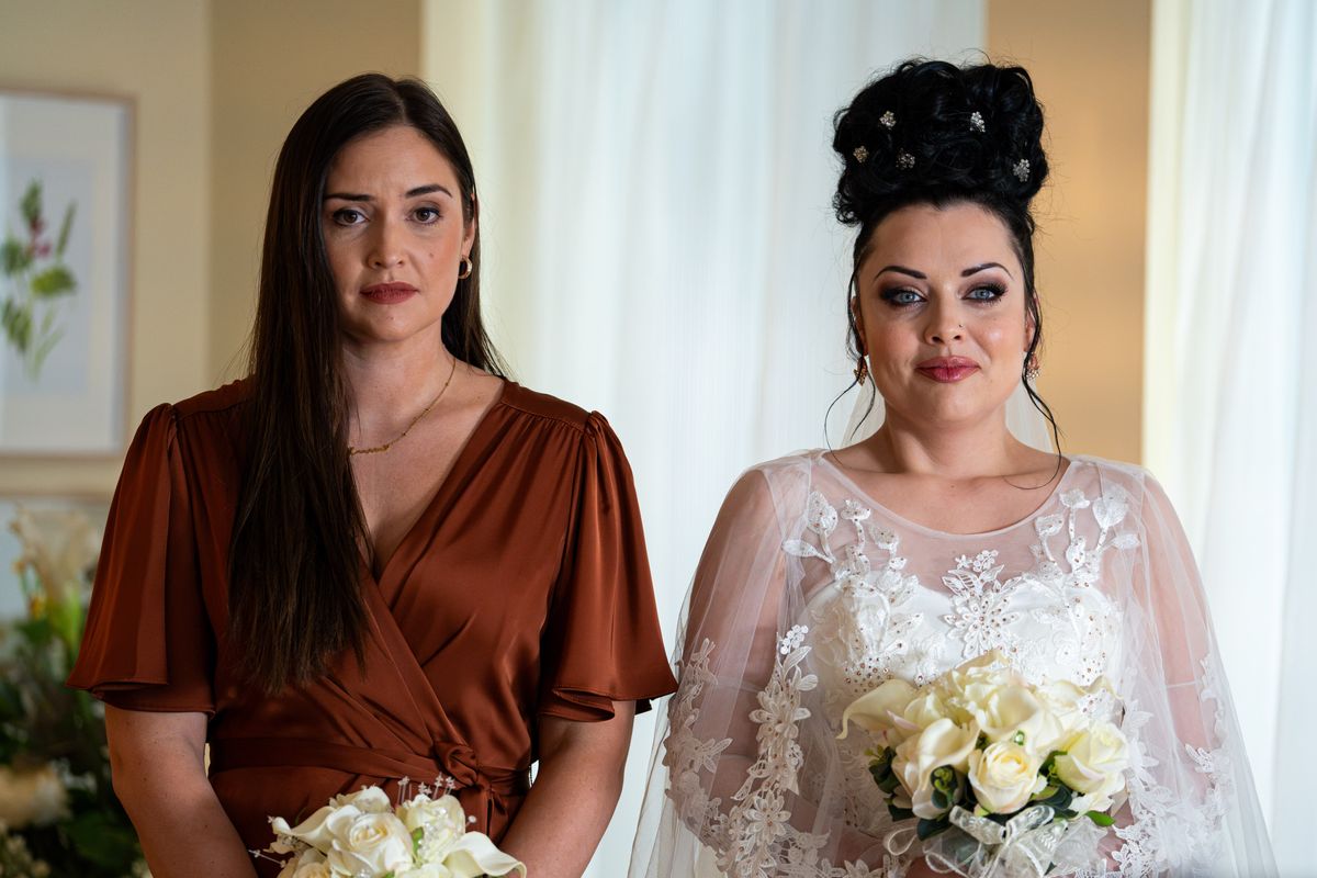 Lauren Branning stands next bride Whitney Dean