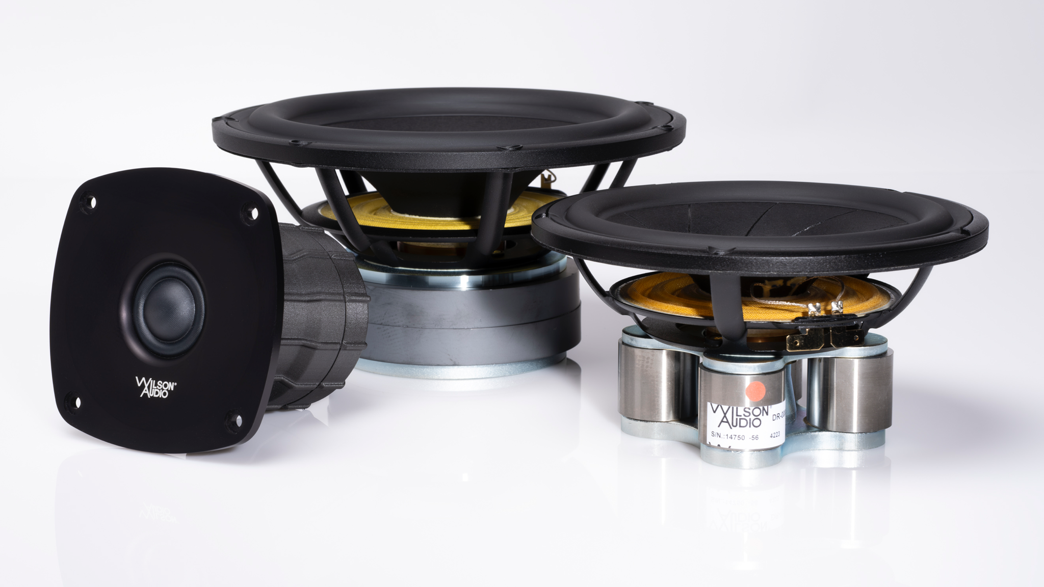 A photo of three Wilson Audio Sabrina V speaker drivers on a white surface