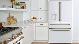 Cafe CVE28DP4NW2 27.6 Cu. Ft. 4-Door French Door Refrigerator pictured in kitchen