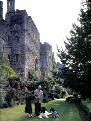 Mr and Mrs Berkeley at Berkeley Castle, Gloucestershire, in 2003. The keep dates to the 1150s. Credit: David Giles/Country Life Picture Library