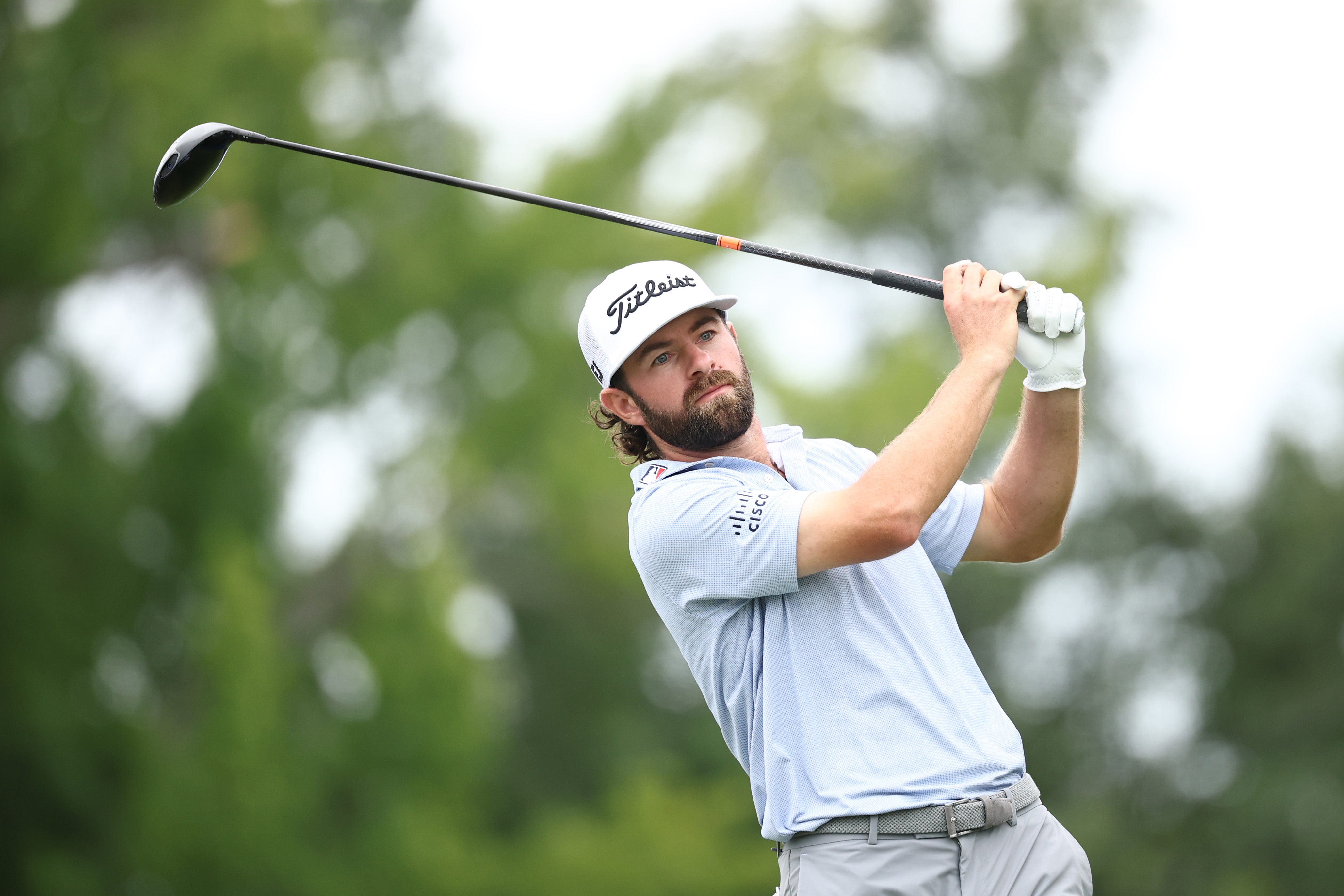 Cameron Young hits a driver