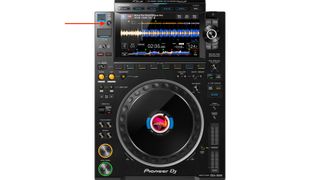 Pioneer CDJ 3000 with a red arrow pointing at the USB stop button