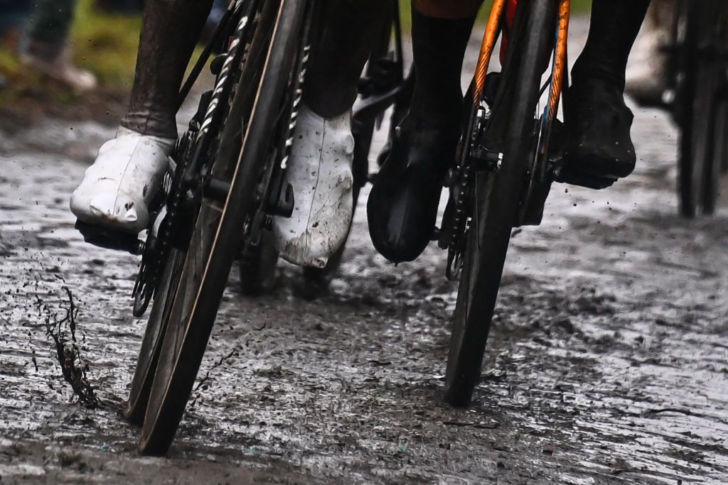 Alpecin Fenix Mathieu Van Der Poel from Netherlands L competes in the 118th edition of the ParisRoubaix oneday classic cycling race between Compiegne and Roubaix northern France on October 3 2021 Photo by AnneChristine POUJOULAT AFP Photo by ANNECHRISTINE POUJOULATAFP via Getty Images
