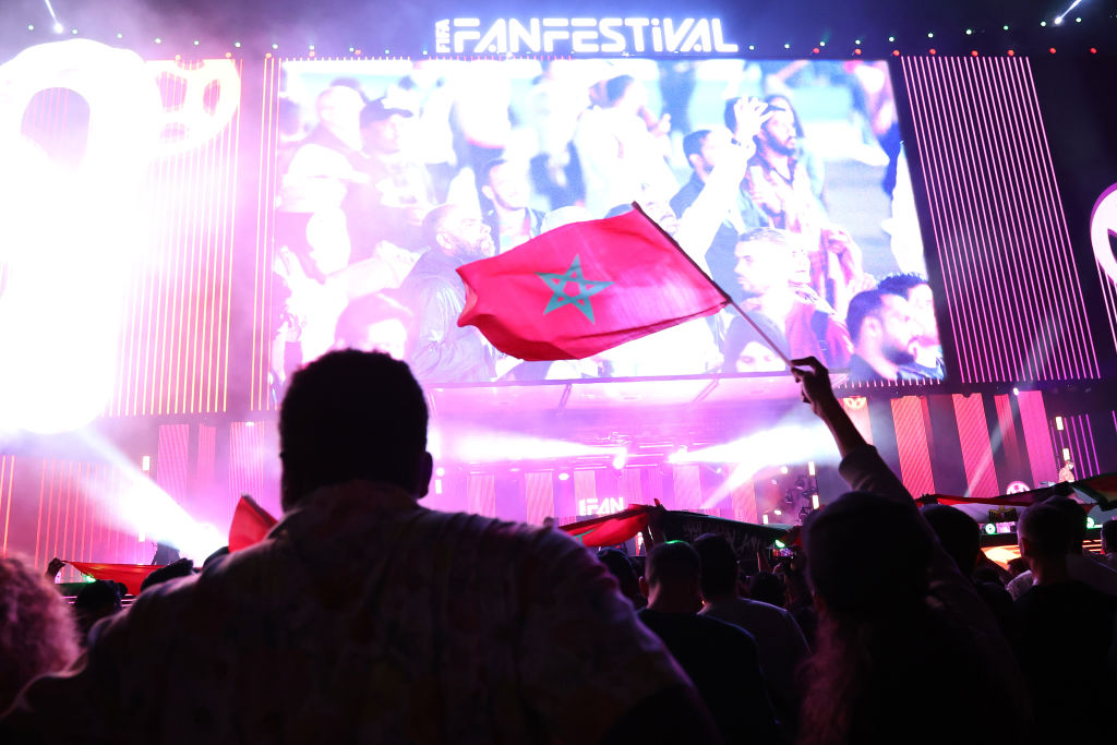 DOHA, QATAR - DECEMBER 14: Fans of Morocco shoe their support during  day 26 of the FIFA World Cup 2022 Qatar Fan Festival at Al Bidda Park on December 14, 2022 in Doha, Qatar. (Photo by Katelyn Mulcahy - FIFA/FIFA via Getty Images)