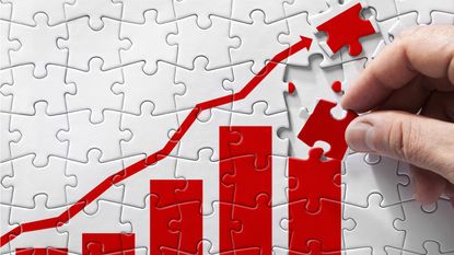 White puzzle pieces are the backdrop for a red line and successively taller red columns indicating rising interest rates.